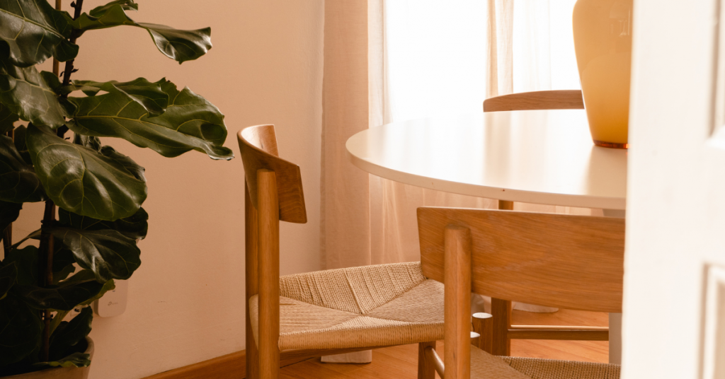 Round wooden dining table and chair