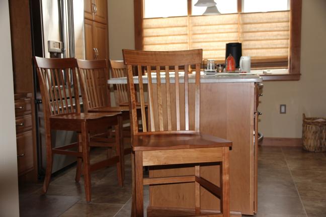 John Salerno purchased our cherry Sharklin Bar Stools with stationary seats