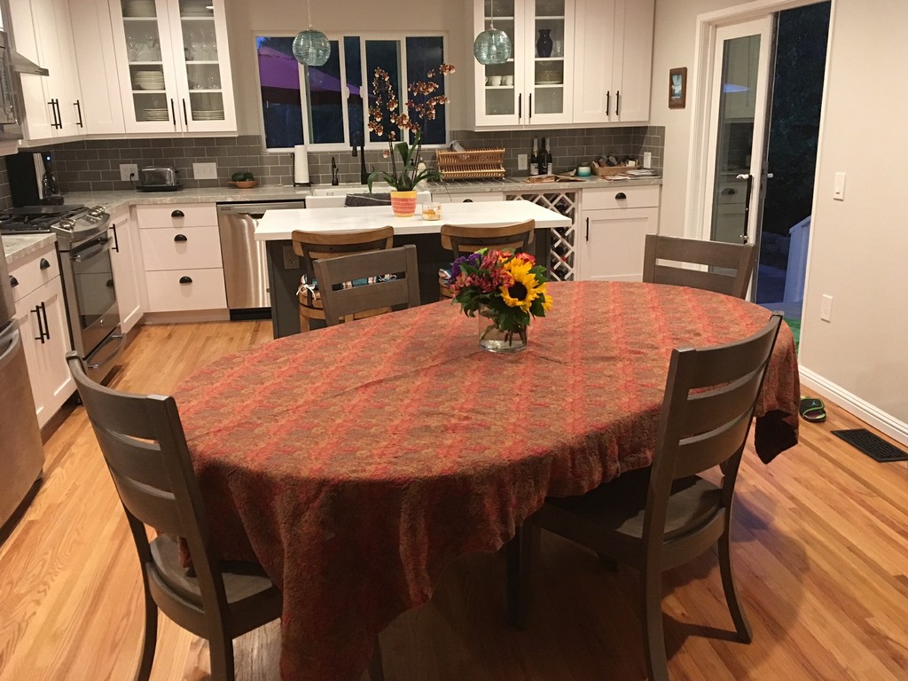 The Imperial Single Pedestal Dining Table accepts up to two leaves