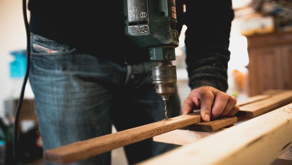 Man working on his woodworking shop