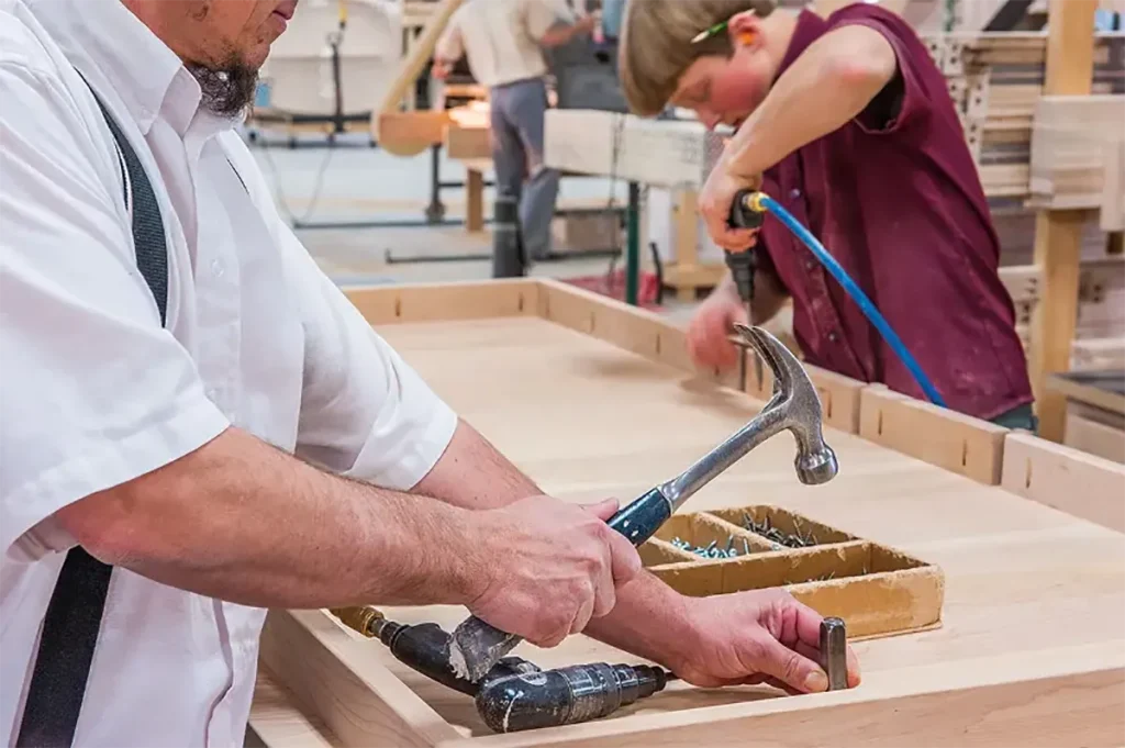 Amish builders doing woodworking