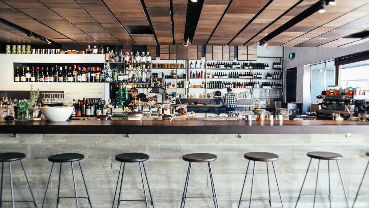 Interior design of a cafe bar with bar height stools