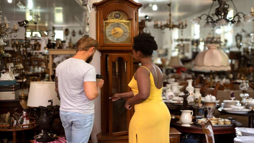 Couple choosing Amish furniture in the factory